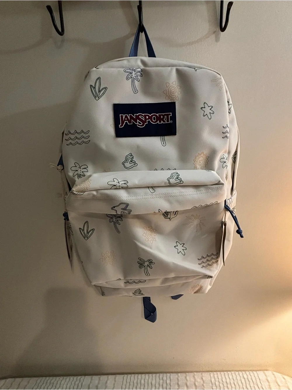Jansport White Backpack with Green and Tan Accent Prints